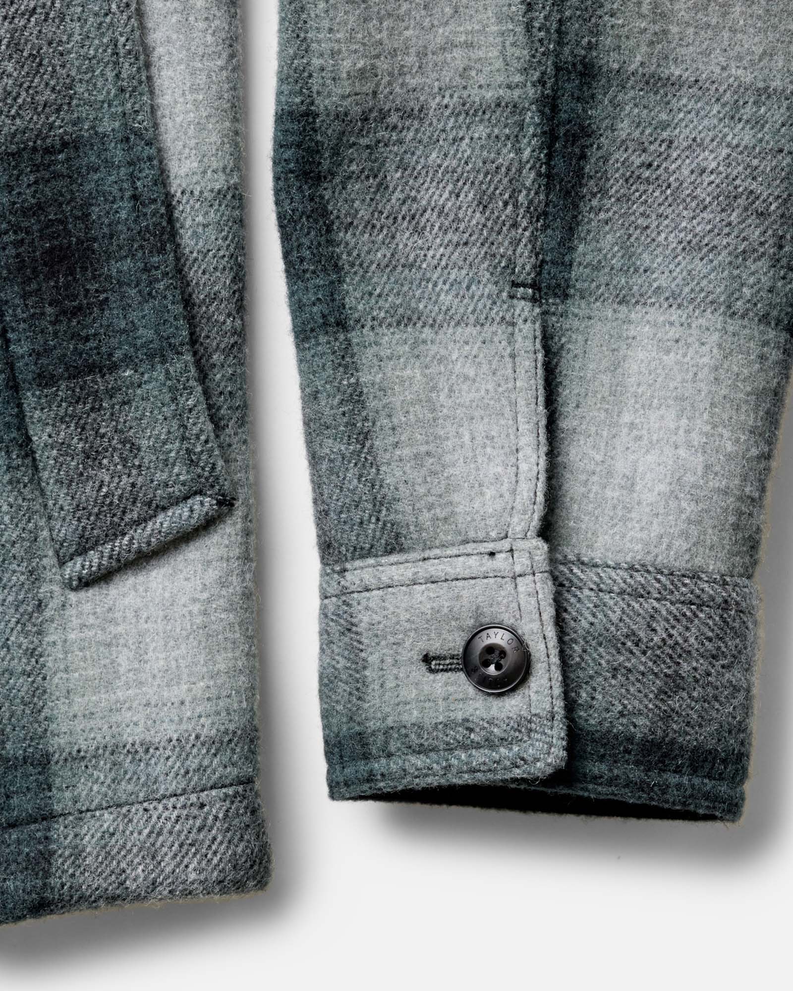 material shot of the sleeves on The Waterfront Jacket in Evergreen Plaid Wool, Outerwear by Taylor Stitch