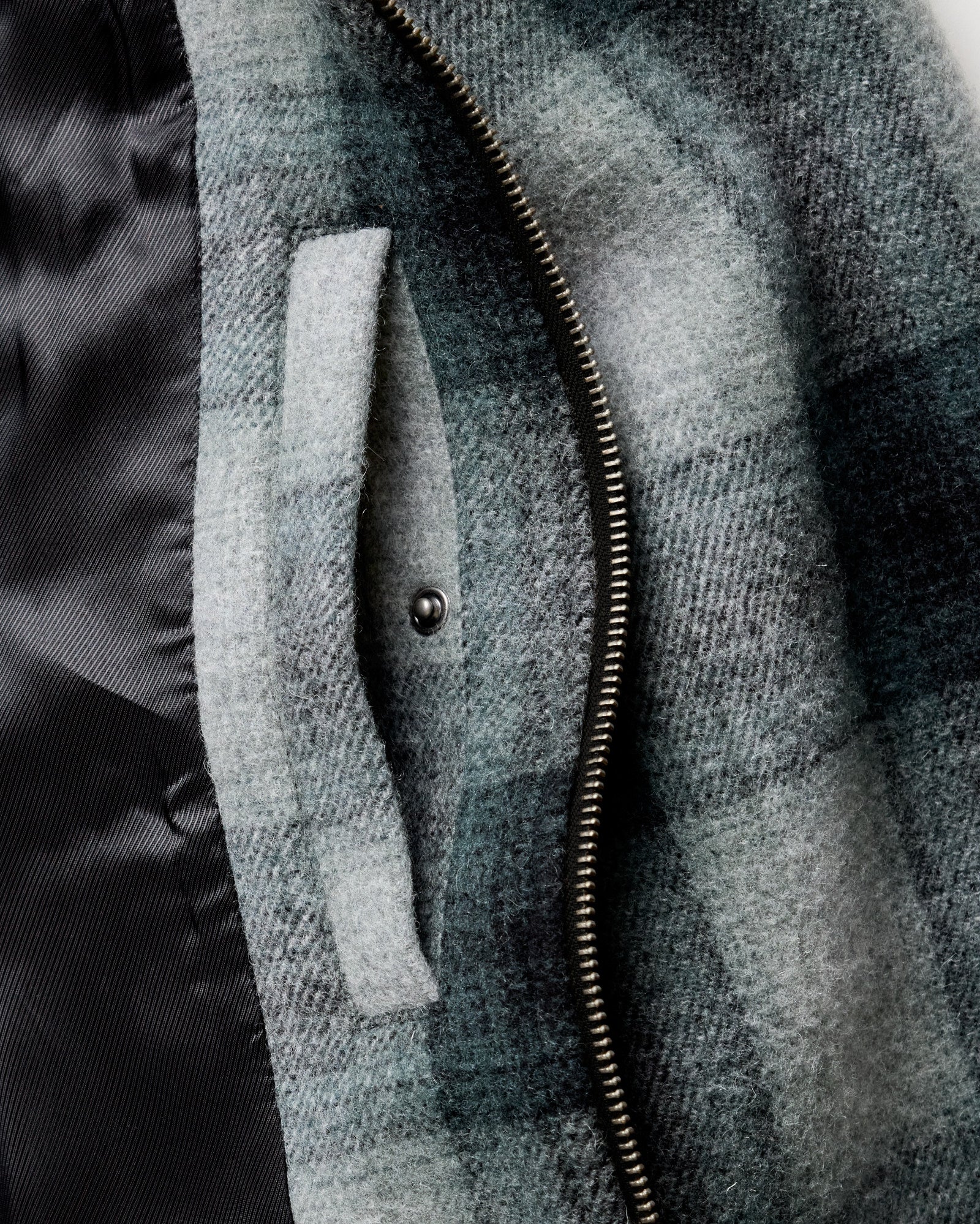 material shot of the inner pocket on The Waterfront Jacket in Evergreen Plaid Wool, Outerwear by Taylor Stitch