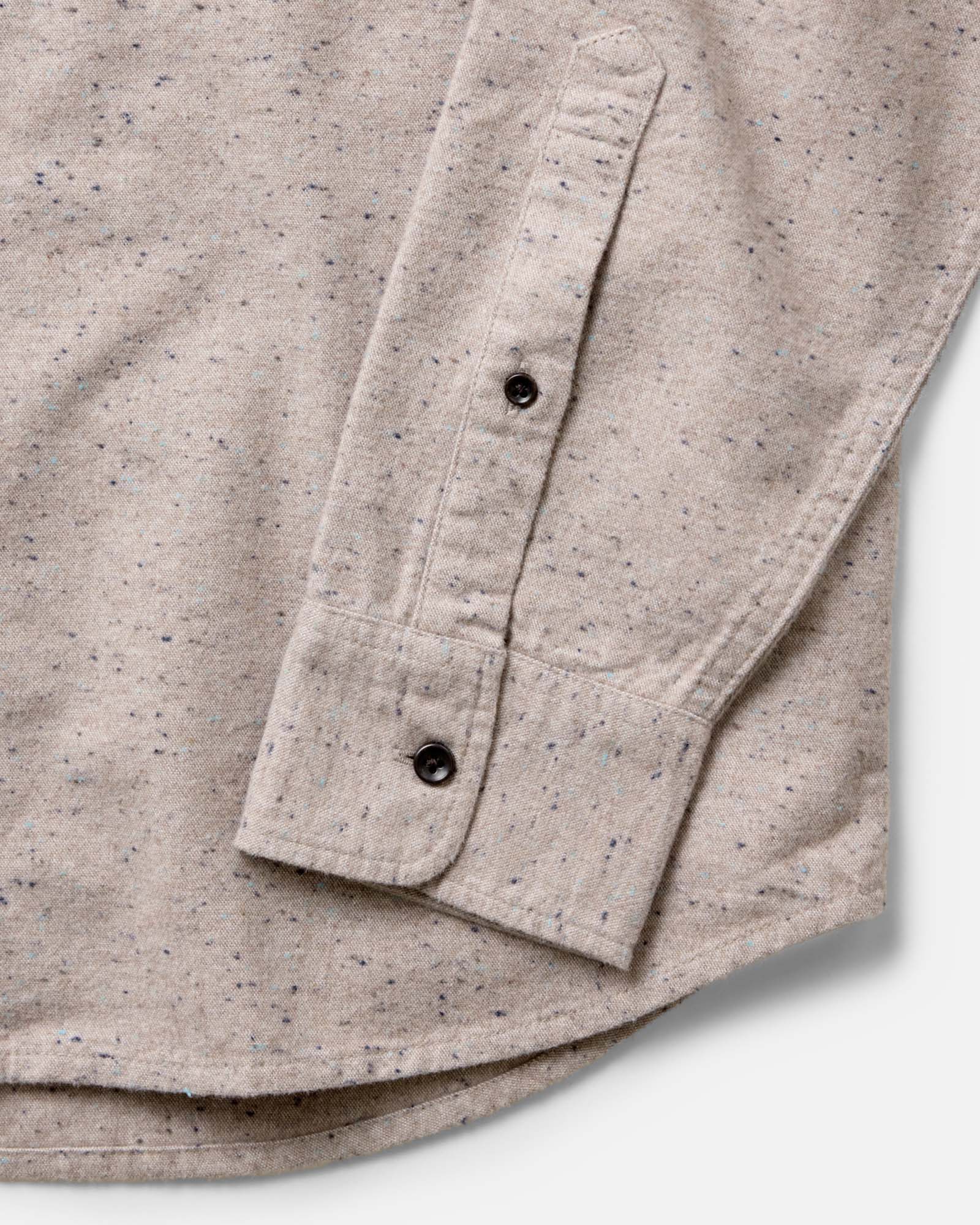 material shot of the sleeve on The Yosemite Shirt in Oat Donegal, Wovens by Taylor Stitch