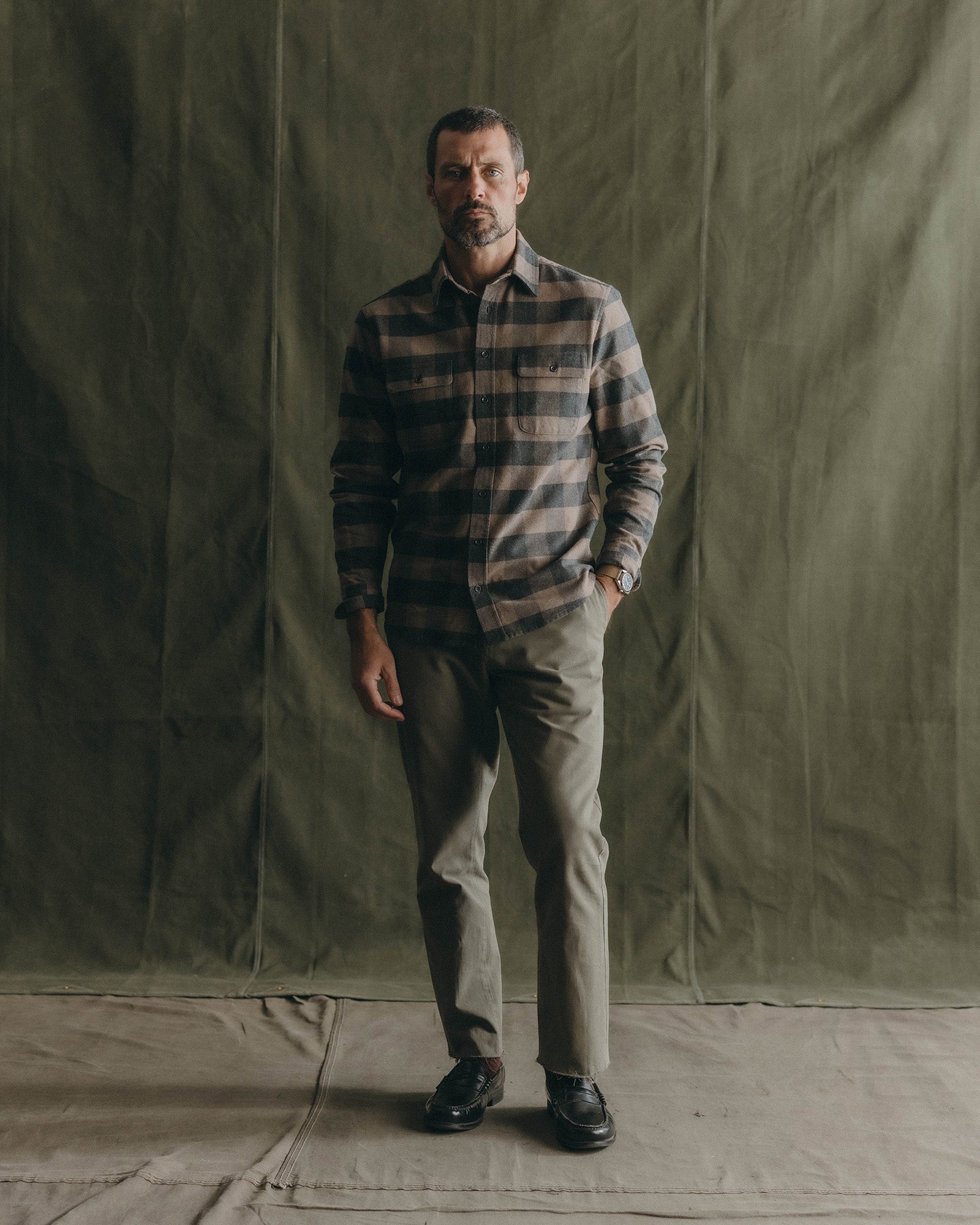 fit model posing in The Yosemite Shirt in Heather Sable Buffalo Check, Wovens by Taylor Stitch