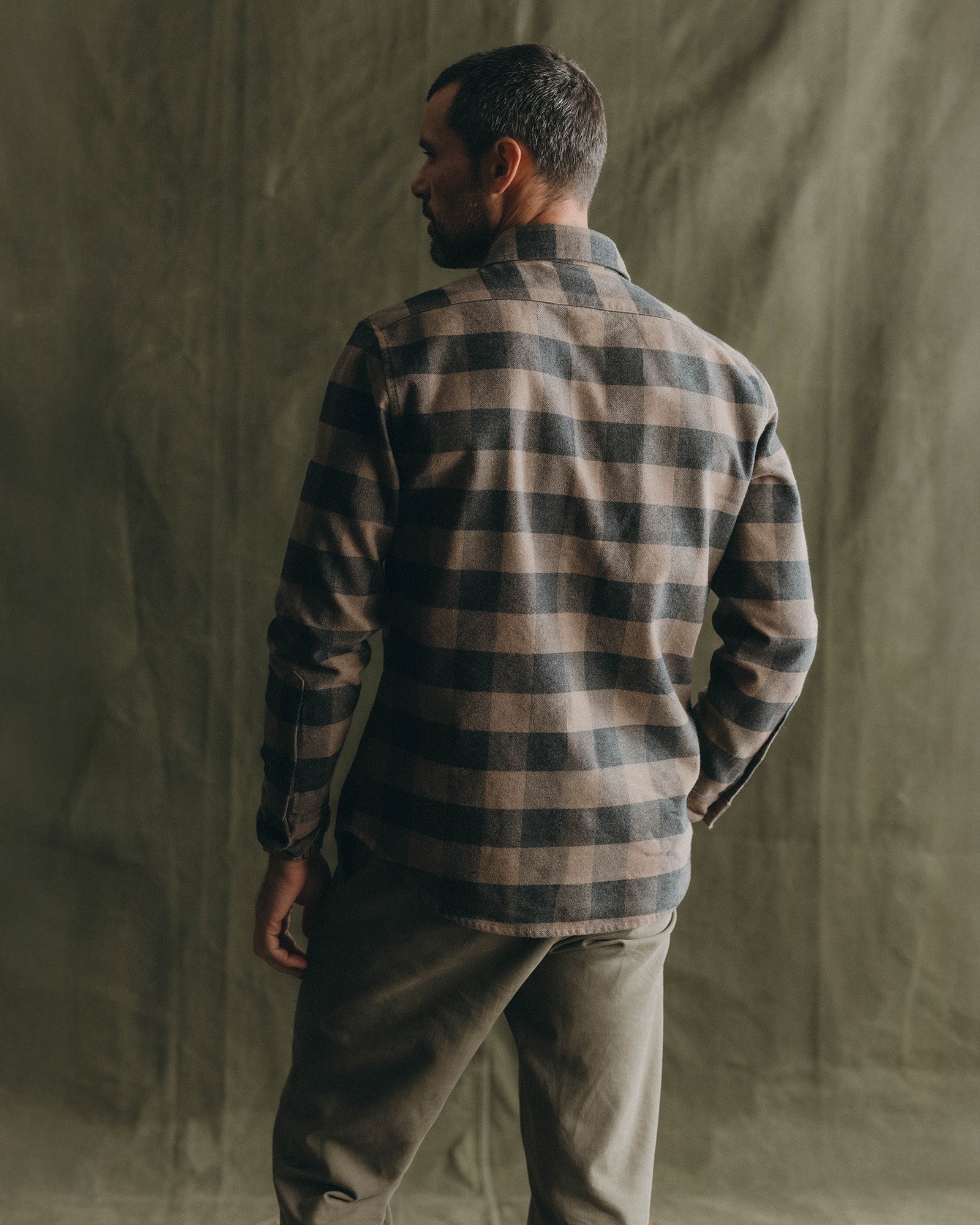 fit model showing off the back of The Yosemite Shirt in Heather Sable Buffalo Check, Wovens by Taylor Stitch