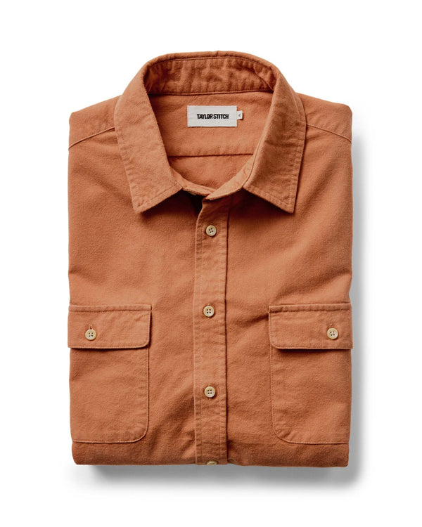 folded flatlay of The Yosemite Shirt in Summit Orange
