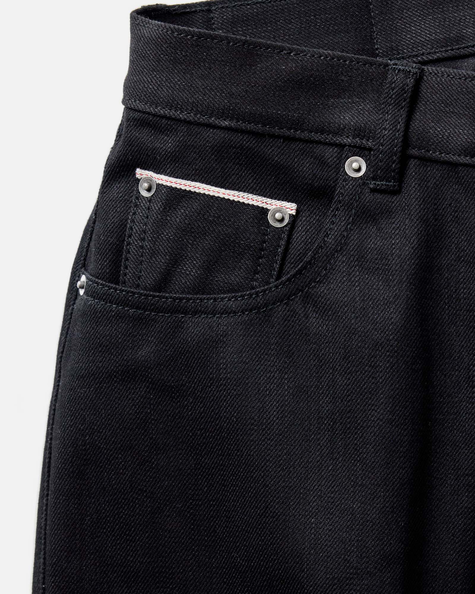material shot of the waistband on The Democratic Jean in Rigid Black Organic Selvedge, Bottoms by Taylor Stitch