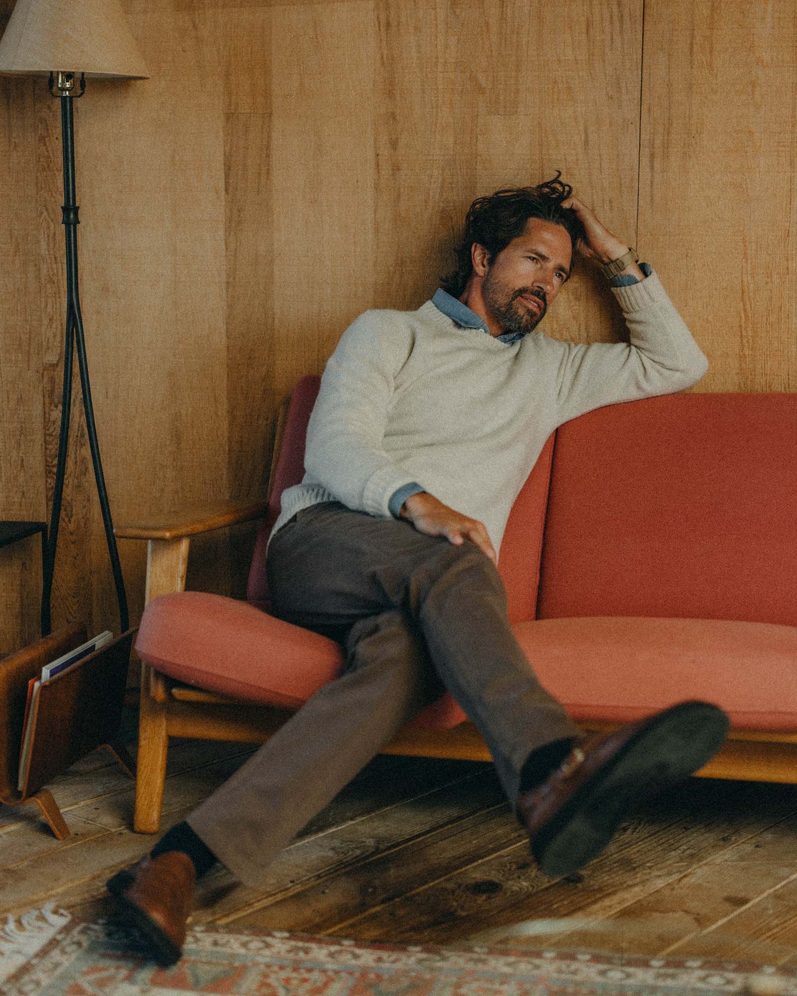 fit model posing in The Eastmoor Sweater in Heather Ivory Wool, Knits by Taylor Stitch