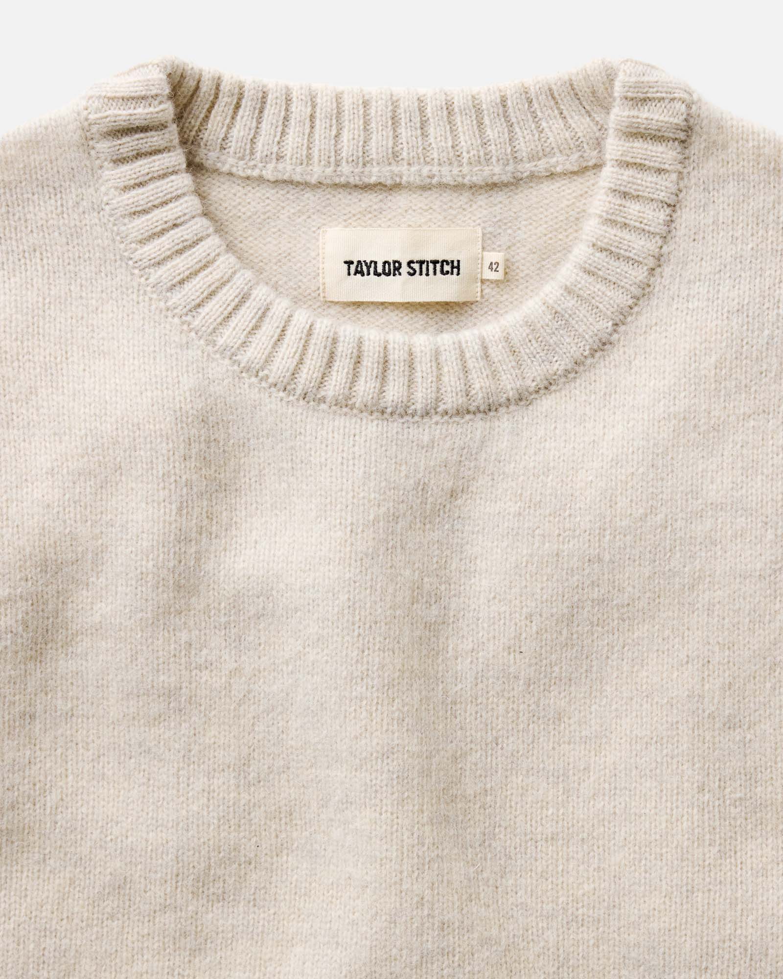 material shot of the collar on The Eastmoor Sweater in Heather Ivory Wool, Knits by Taylor Stitch