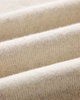 material shot of the fabric on The Eastmoor Sweater in Heather Ivory Wool, Knits by Taylor Stitch
