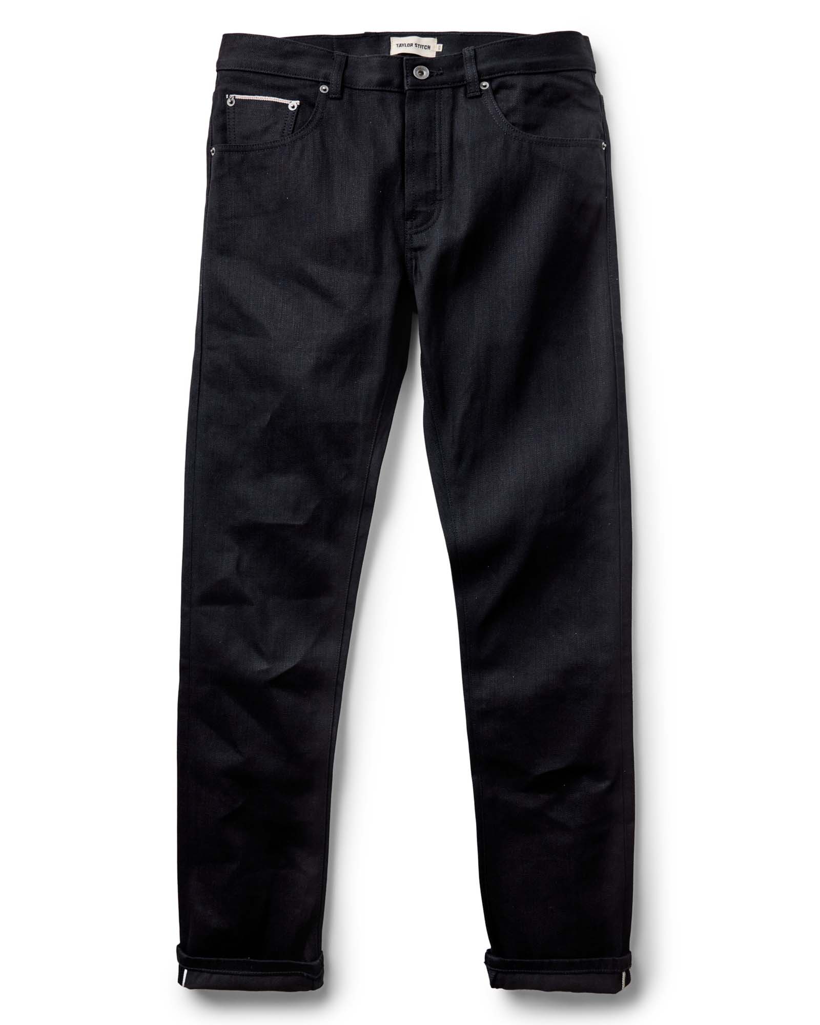 flatlay of The Slim Jean in Rigid Black Organic Selvedge, Bottoms by Taylor Stitch