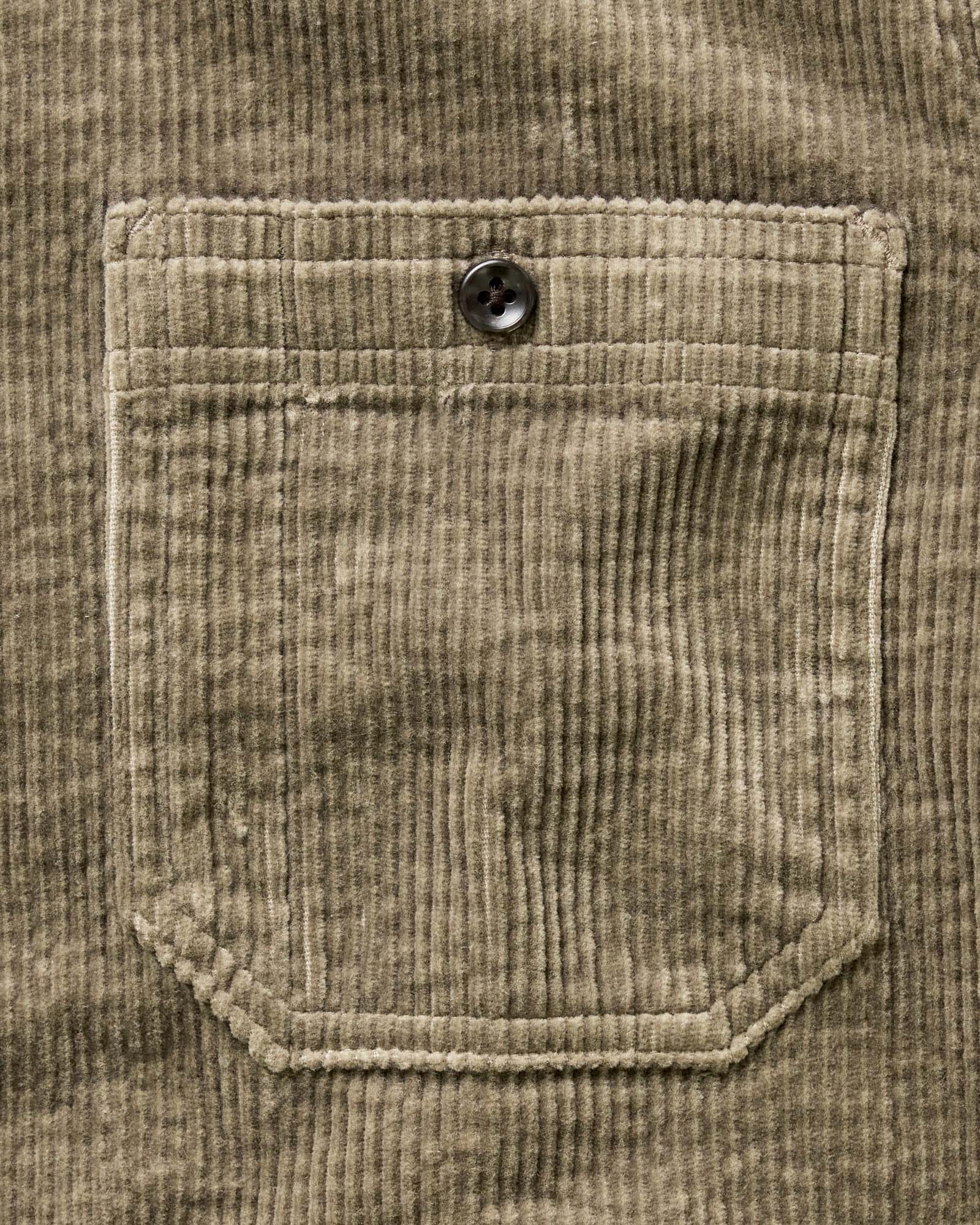 material shot of the pocket on The Utility Shirt in Fatigue Olive Corduroy, Wovens by Taylor Stitch