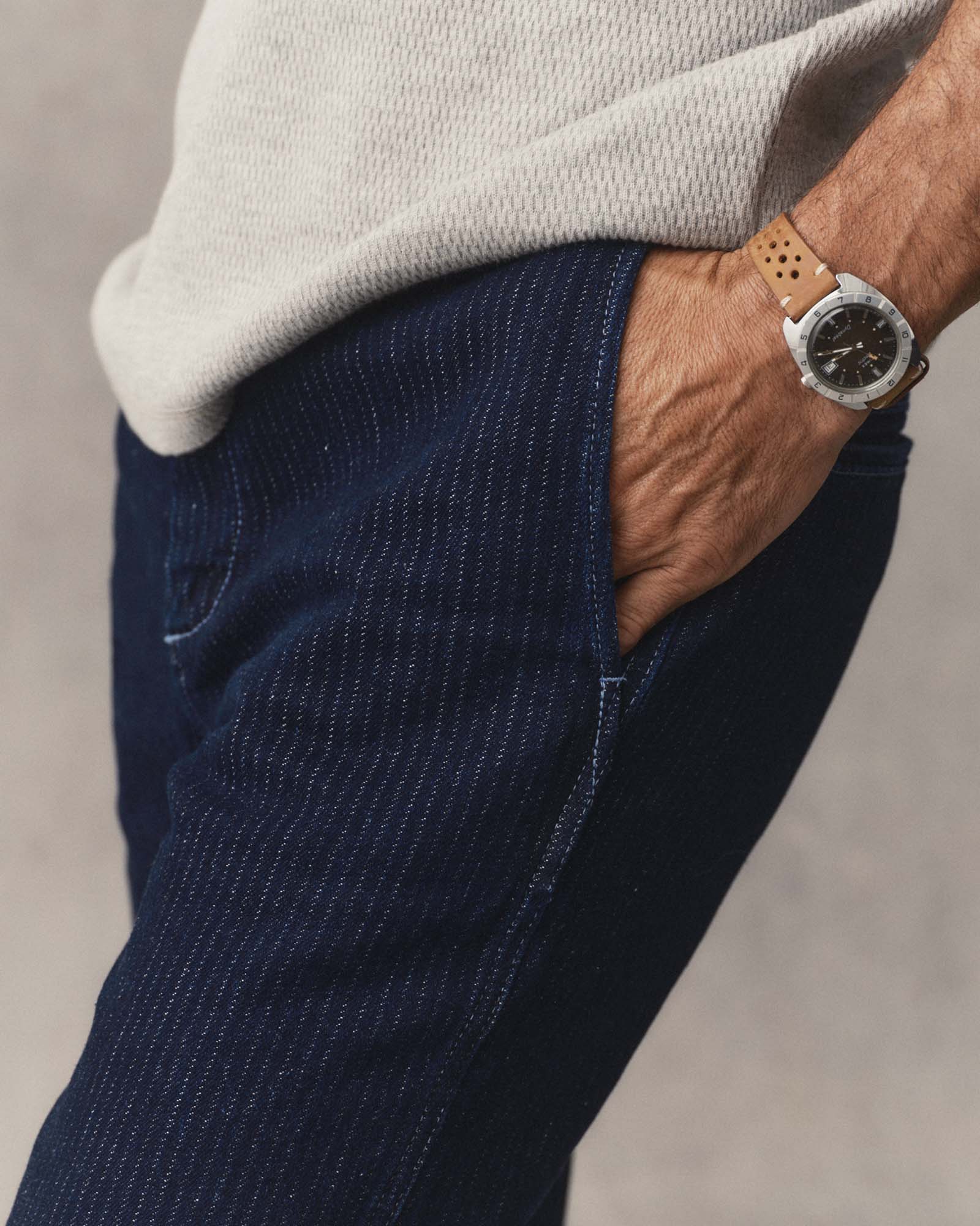 fit model with his hands in the pockets of The Camden Pant in Rinsed Indigo Roped Denim, Bottoms by Taylor Stitch