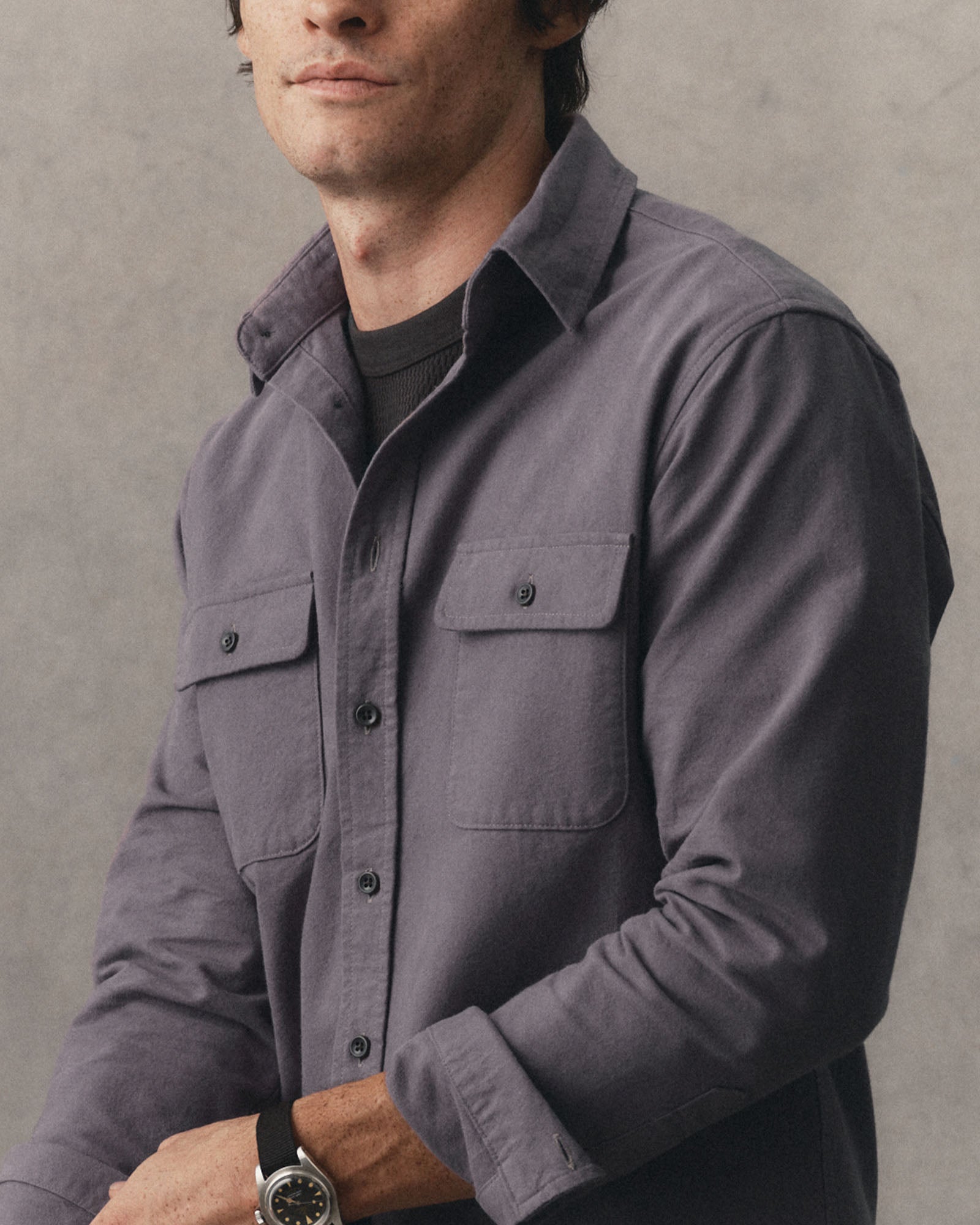 fit model posing in The Yosemite Shirt in Dried Plum, Wovens by Taylor Stitch