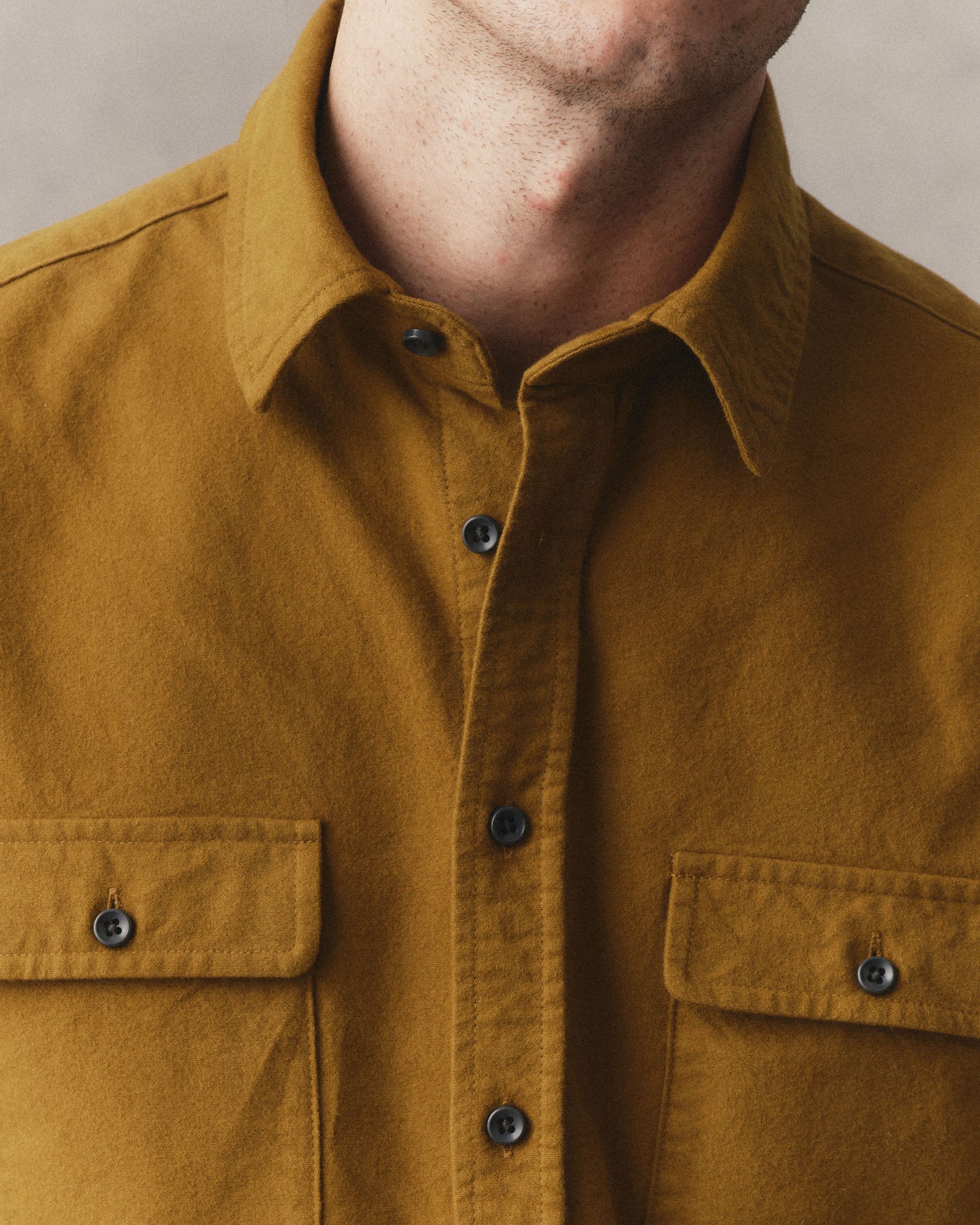 fit model showing off the collar on The Yosemite Shirt in Saffron, Wovens by Taylor Stitch