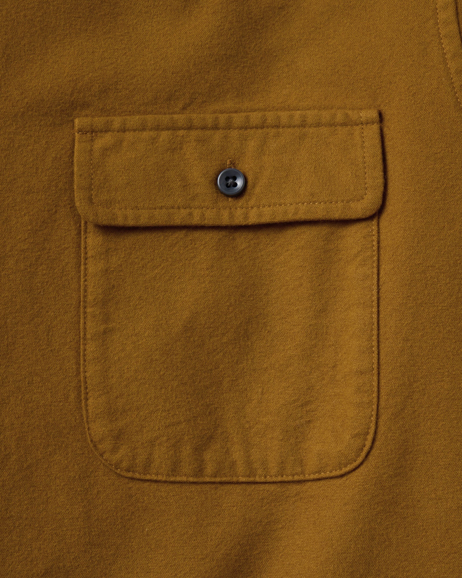 material shot of the pocket on The Yosemite Shirt in Saffron, Wovens by Taylor Stitch