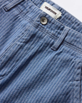 material shot of the button fly on The Morse Pant in Bleached Indigo Herringbone, Bottoms by Taylor Stitch