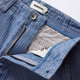 material shot of the zipper fly on The Morse Pant in Bleached Indigo Herringbone