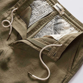 material shot of the zipper on The Easy Short in Olive Linen
