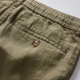material shot of the back pocket on The Easy Short in Olive Linen