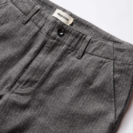 material shot of the button fly on The Carnegie Pant in Granite Herringbone