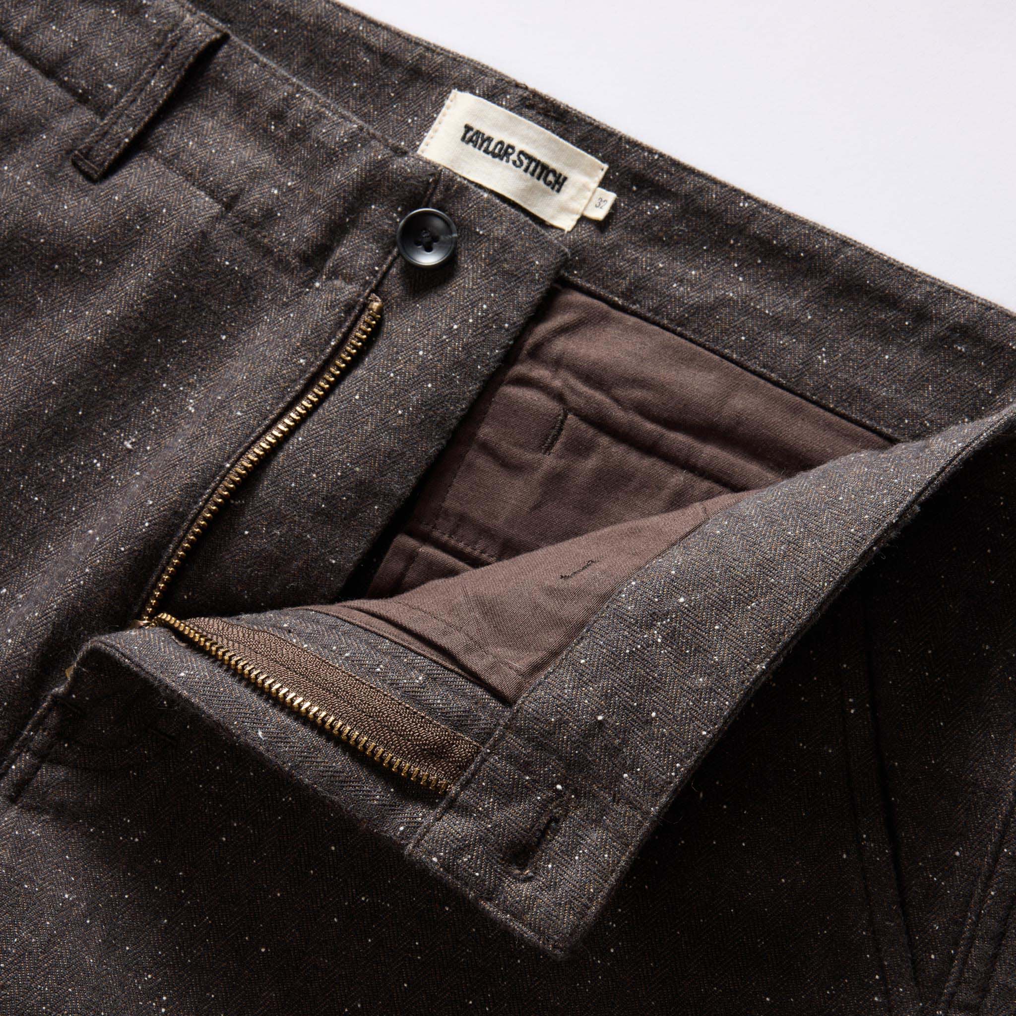 material shot of the zipper fly on The Carnegie Pant in Peat Herringbone, Bottoms by Taylor Stitch