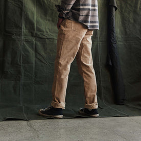 fit model showing the side of The Democratic All Day Pant in Light Khaki Cord