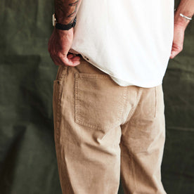 fit model showing the back of The Democratic All Day Pant in Light Khaki Cord