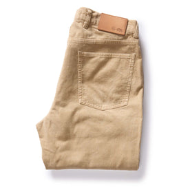 flatlay of The Democratic All Day Pant in Light Khaki Cord, shown folded from back