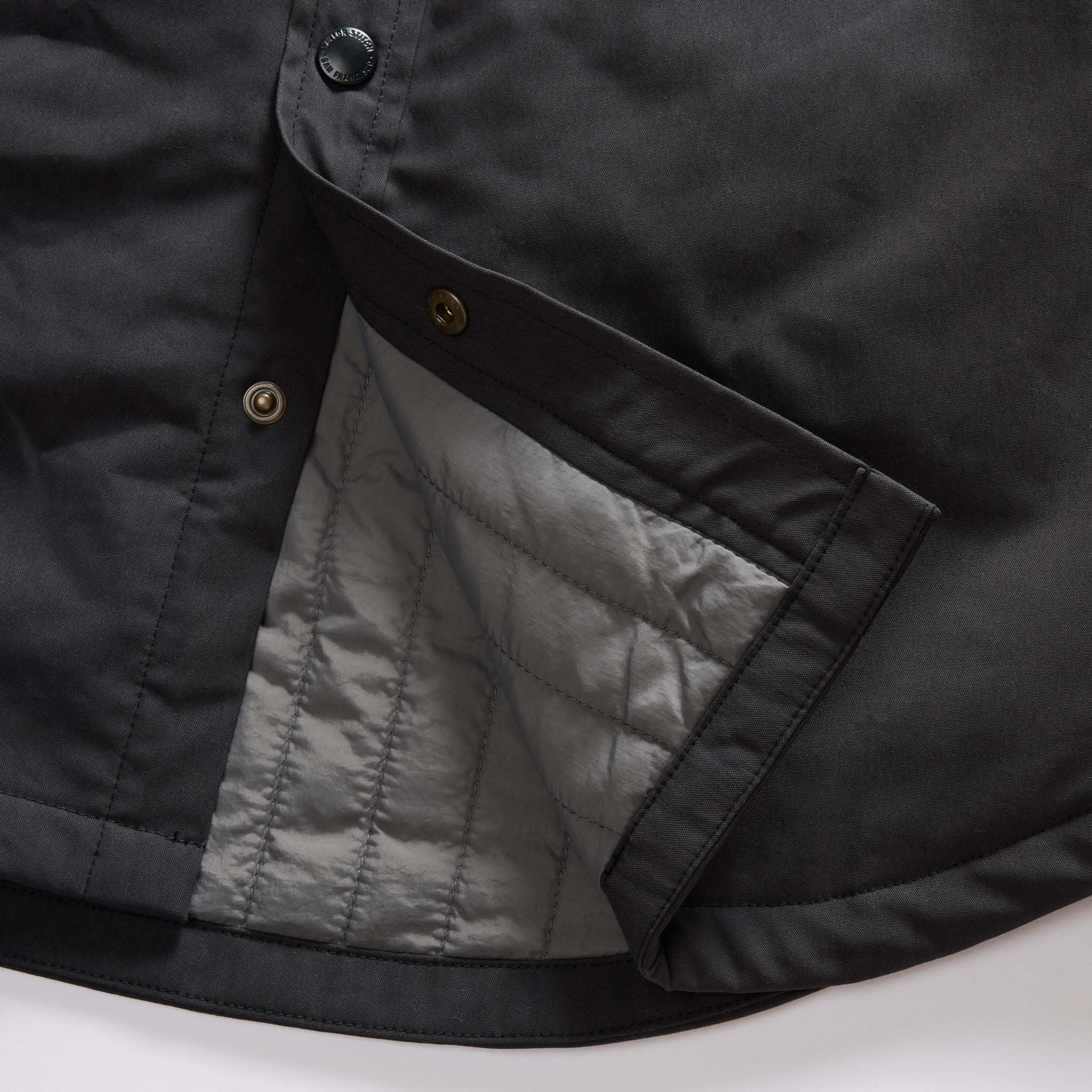 material shot of the lining on The Lined Maritime Shirt Jacket in Coal, Wovens by Taylor Stitch