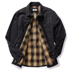 flatlay of The Lined Utility Shirt in Washed Black Denim, shown with plaid lining inside