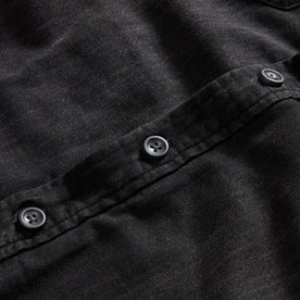 material shot of the buttons on The Lined Utility Shirt in Washed Black Denim