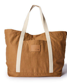 flatlay of The Market Tote in Cedar Boss Duck, Accessories by Taylor Stitch