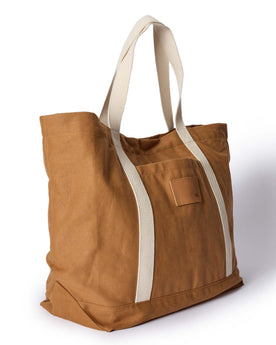 material shot of the side of The Market Tote in Cedar Boss Duck, Accessories by Taylor Stitch