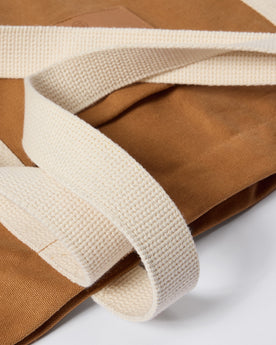 material shot of the handles on The Market Tote in Cedar Boss Duck, Accessories by Taylor Stitch