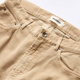 material shot of the button fly on The Slim All Day Pant in Light Khaki Cord