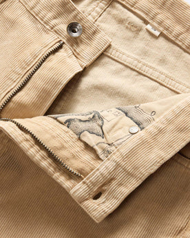 material shot of the zipper fly on The Slim All Day Pant in Light Khaki Cord, Bottoms by Taylor Stitch