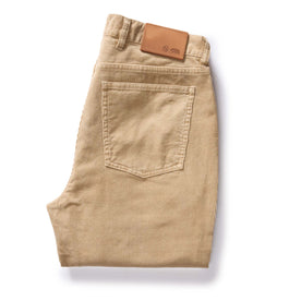 flatlay of The Slim All Day Pant in Light Khaki Cord, shown folded from back