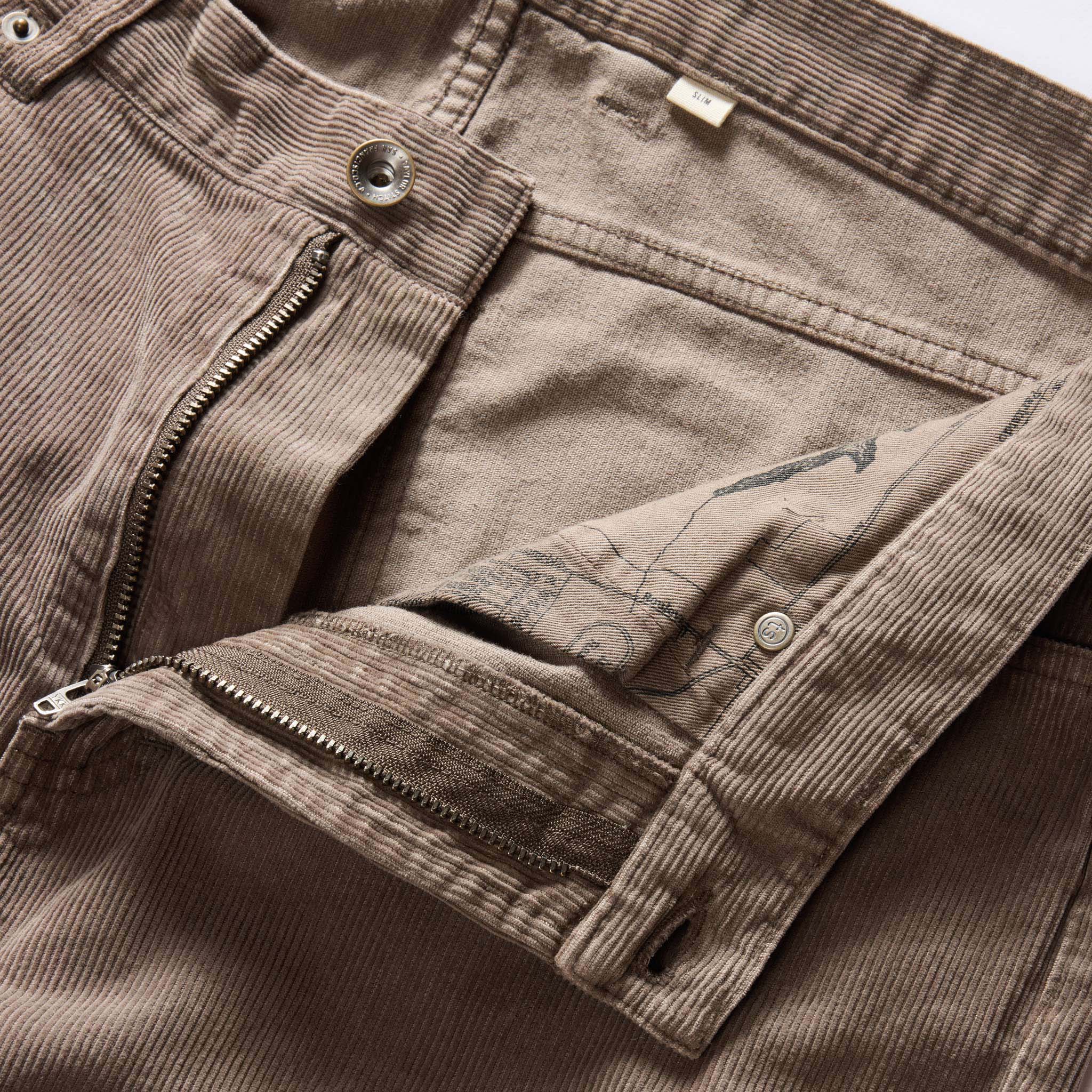 material shot of the zipper fly on The Slim All Day Pant in Morel Cord, Bottoms by Taylor Stitch