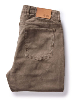 flatlay of The Slim All Day Pant in Morel Cord, shown folded from the back, Bottoms by Taylor Stitch