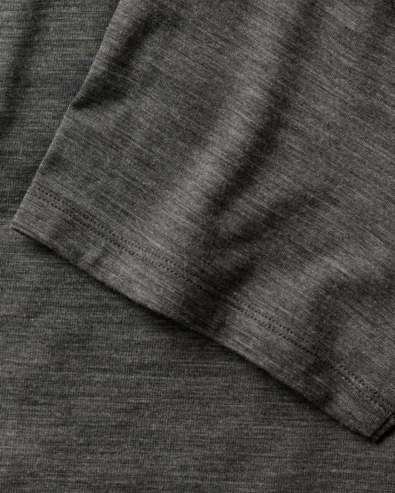 material shot of the sleeve on The Merino Polo in Heather Army, Knits by Taylor Stitch