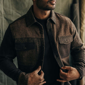 fit model adjusting The Patchwork Overshirt in Timber Tweed