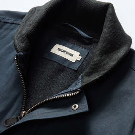 material shot of the collar on The Deck Jacket in Dark Navy Dry Wax