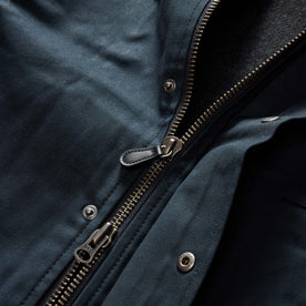 material shot of the two-way separating zipper on The Deck Jacket in Dark Navy Dry Wax