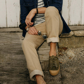 fit model showing the front of The Democratic All Day Pant in Light Khaki Broken Twill