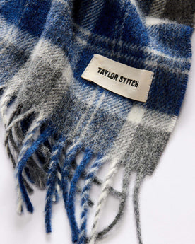 material shot of the TS label on The Fireside Scarf in Blue Check Merino, Accessories by Taylor Stitch