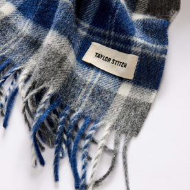 material shot of the TS label on The Fireside Scarf in Blue Check Merino