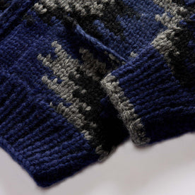 material shot of the chunky knit on The Seawall Hand-Knit Sweater in Navy Kilim