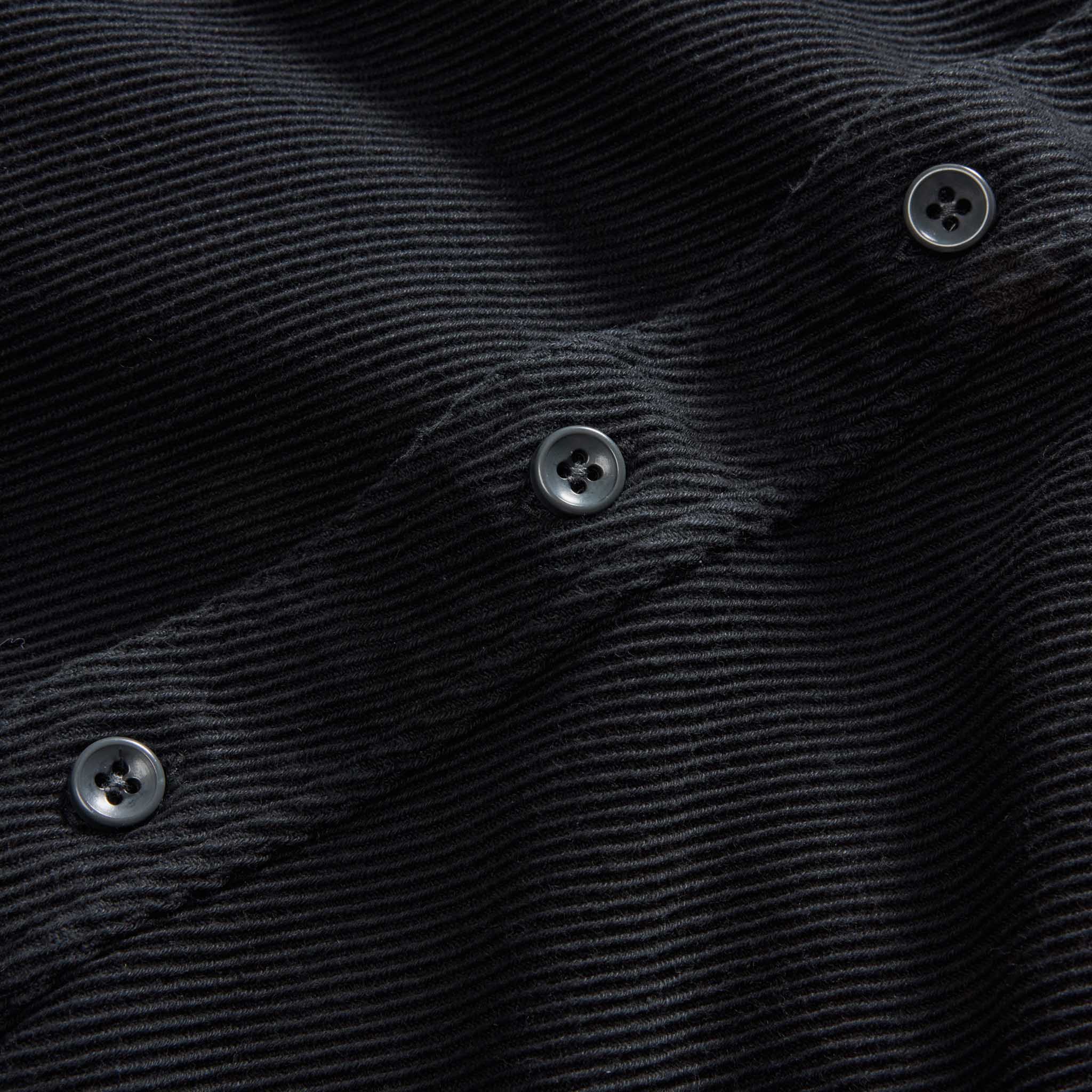 material shot of the buttons on The Ledge Shirt in Coal, Wovens by Taylor Stitch