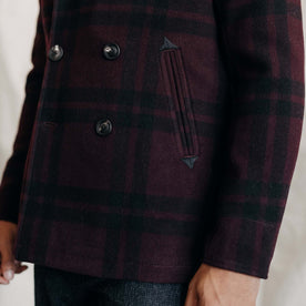 fit model showing the side pockets and horn buttons on The Mariner Coat in Port Plaid Wool