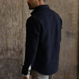 fit model showing the back of The Maritime Shirt Jacket in Navy Wool
