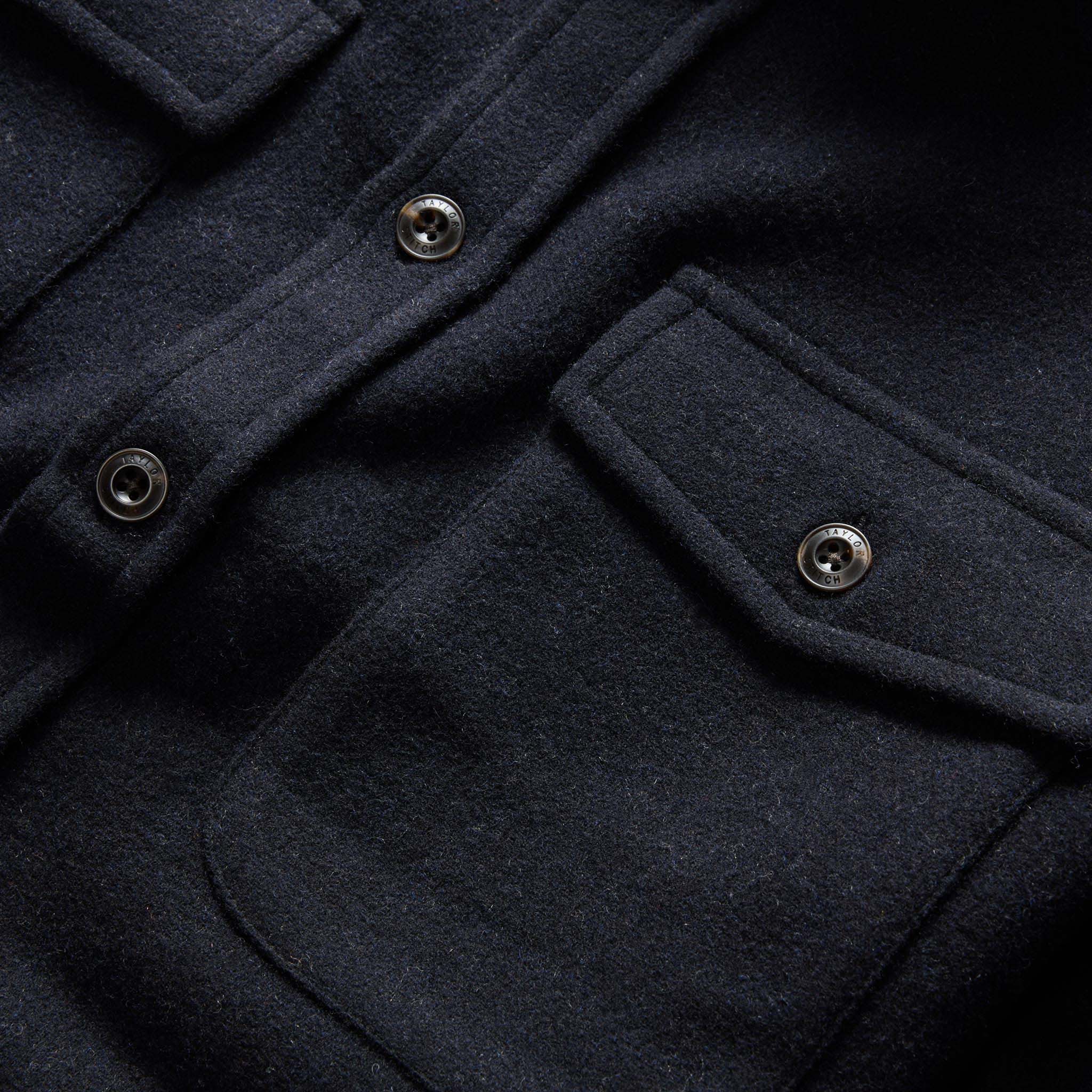 material shot of the front chest pockets on The Maritime Shirt Jacket in Navy Wool, Wovens by Taylor Stitch