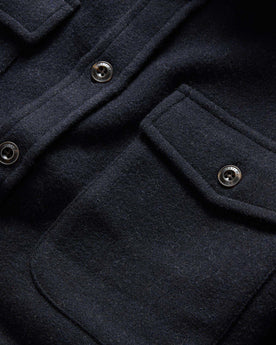material shot of the front chest pockets on The Maritime Shirt Jacket in Navy Wool, Wovens by Taylor Stitch