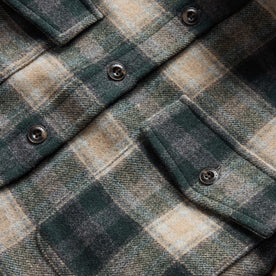 material shot of the front chest pockets on The Maritime Shirt Jacket in Dried Pine Plaid